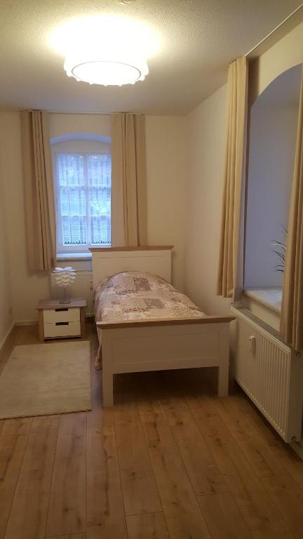 Postel nebo postele na pokoji v ubytování Haus Moritzburg