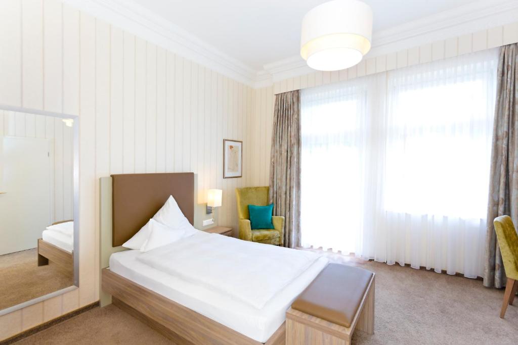 Postel nebo postele na pokoji v ubytování Hotel Noltmann-Peters