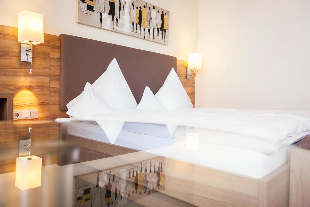 Postel nebo postele na pokoji v ubytování Hotel Noltmann-Peters