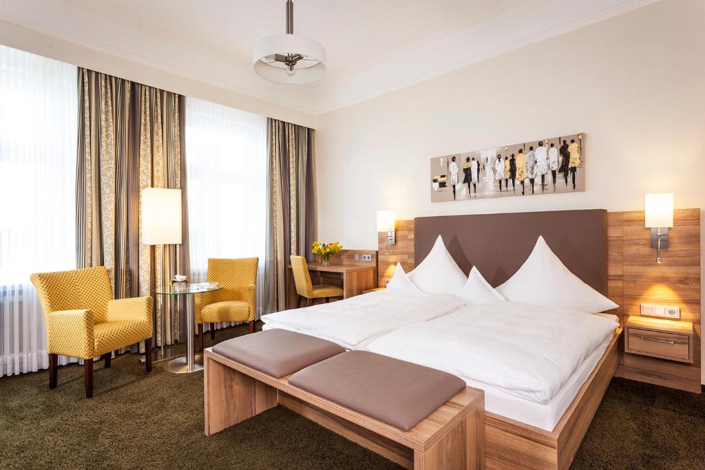 Postel nebo postele na pokoji v ubytování Hotel Noltmann-Peters