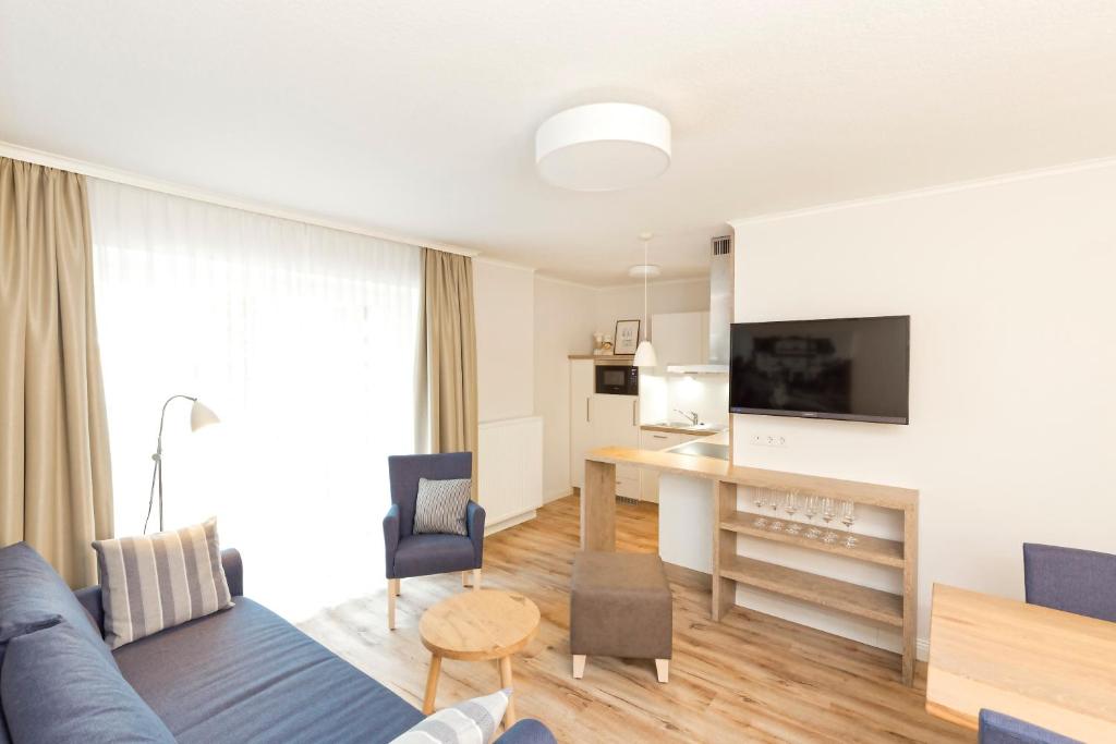 TV a/nebo společenská místnost v ubytování Hotel Noltmann-Peters