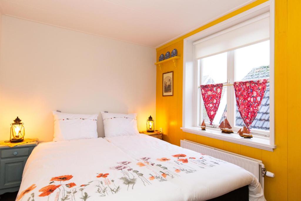 Postel nebo postele na pokoji v ubytování Bed and Breakfast De Pepersteeg