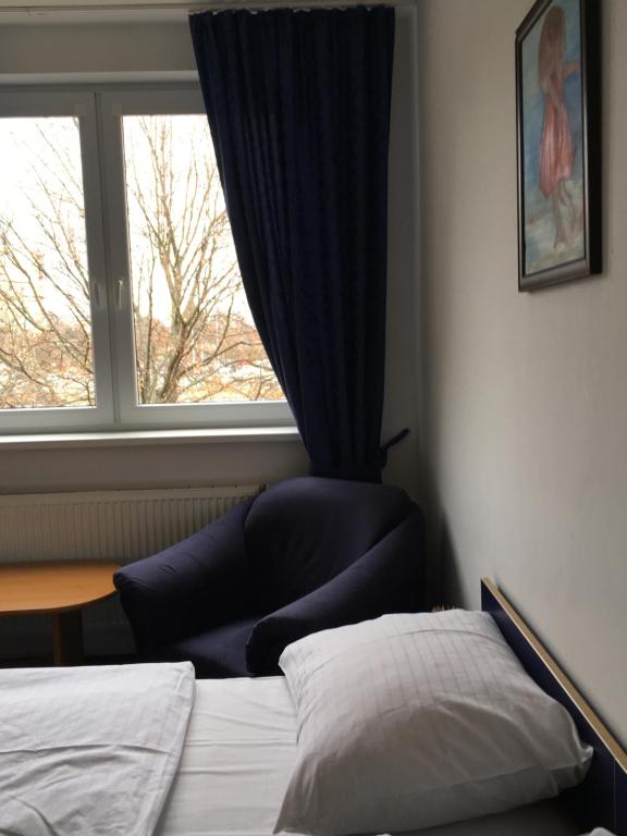 Postel nebo postele na pokoji v ubytování Hotel Arko