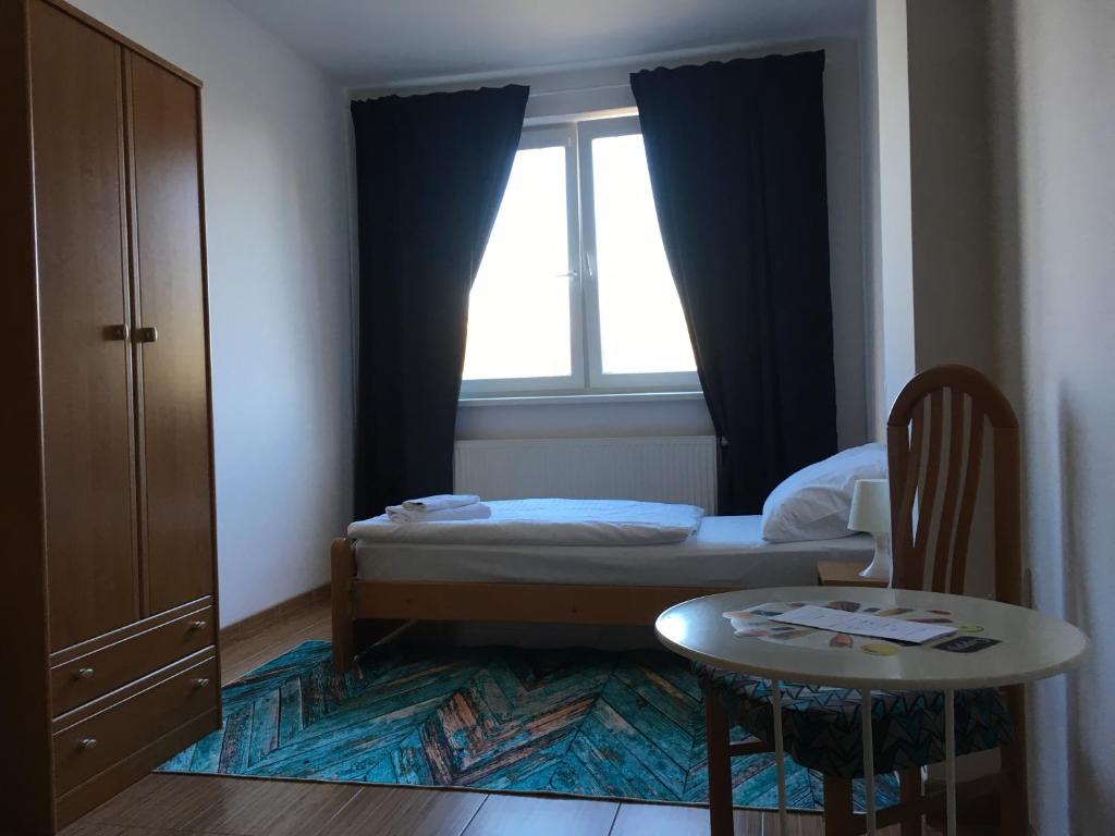 Postel nebo postele na pokoji v ubytování Hotel Arko