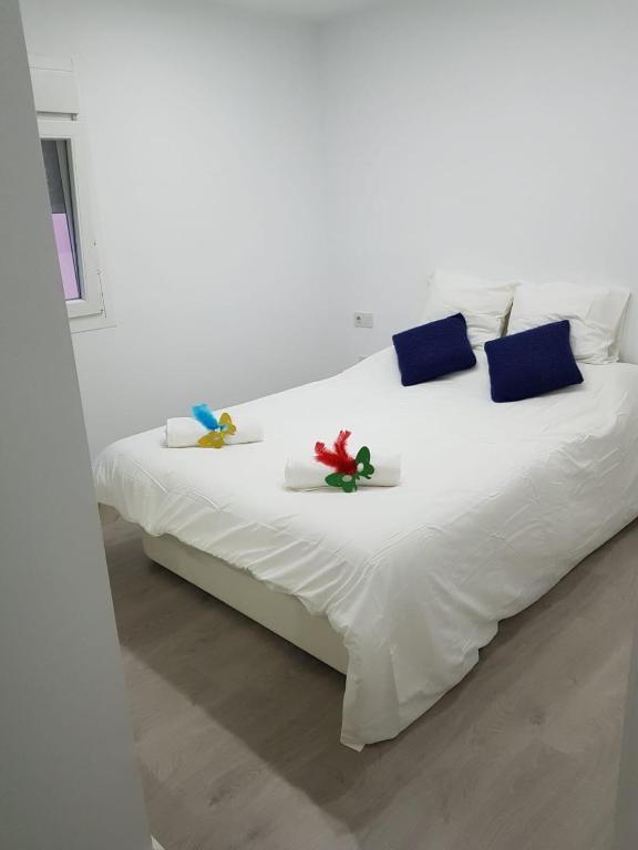 Postel nebo postele na pokoji v ubytování Caleta