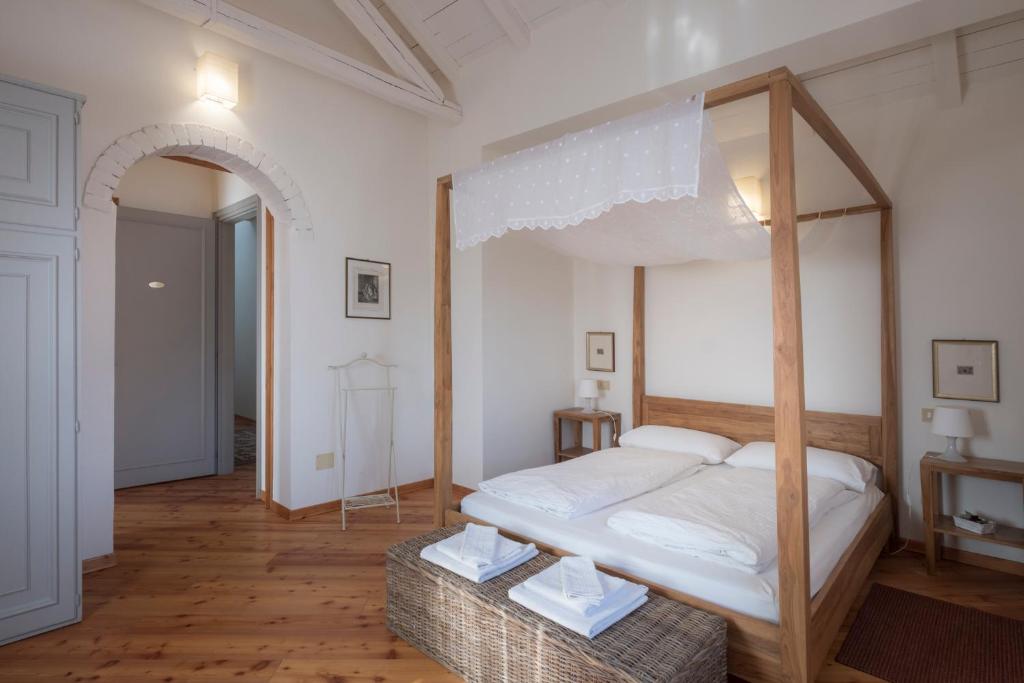 Postel nebo postele na pokoji v ubytování Oasi Picolit