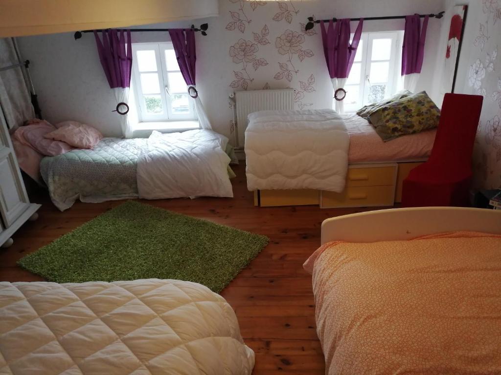 Postel nebo postele na pokoji v ubytování Bernadette