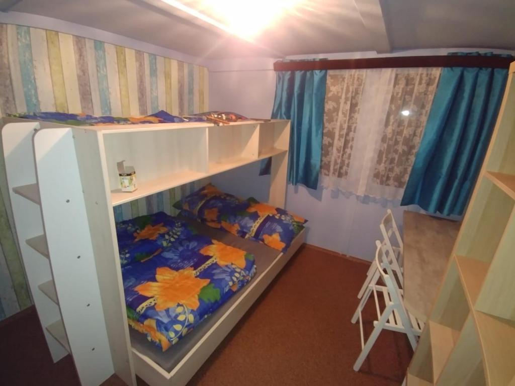 Postel nebo postele na pokoji v ubytování Juniorcamp Nová Živohošť