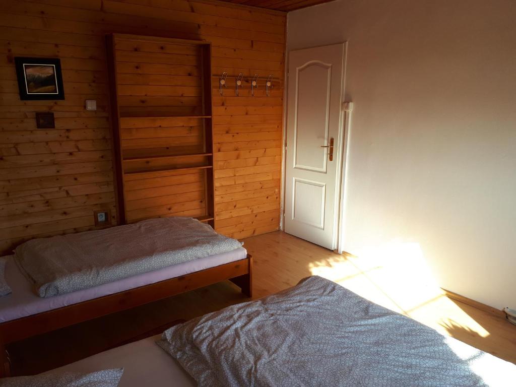 Postel nebo postele na pokoji v ubytování Privát - Melanie