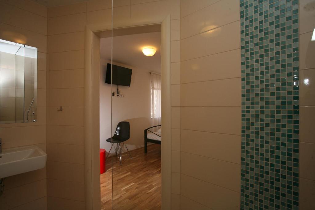 Koupelna v ubytování Rooms Beljan