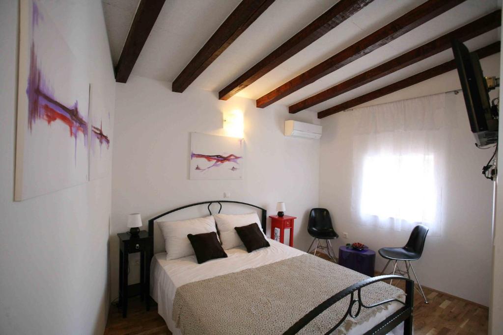 Postel nebo postele na pokoji v ubytování Rooms Beljan