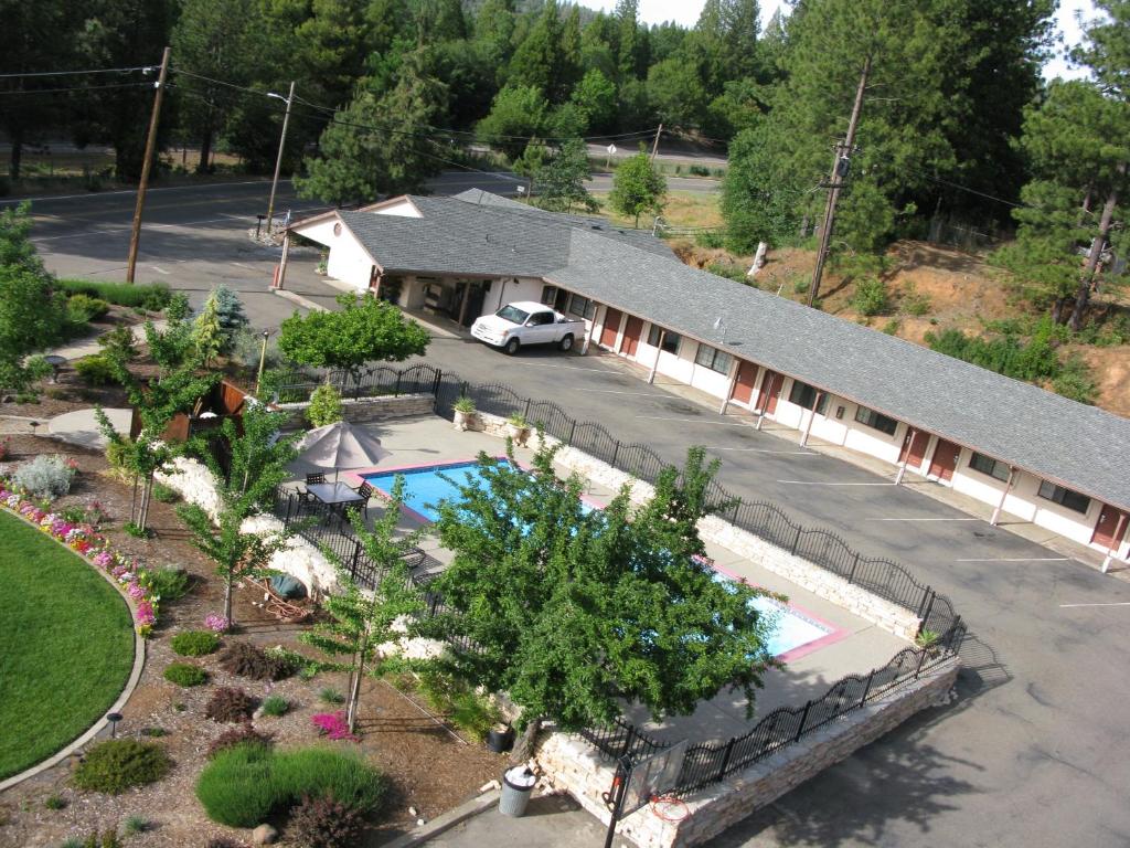 an aerial view of a house with a swimming pool at Mother Lode Motel in Placerville