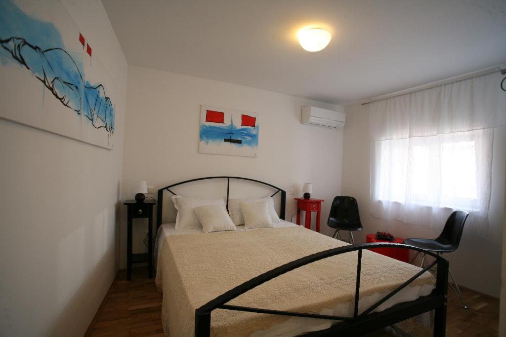 Postel nebo postele na pokoji v ubytování Rooms Beljan