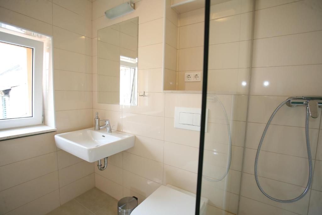 Koupelna v ubytování Rooms Beljan