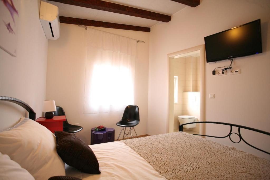 TV a/nebo společenská místnost v ubytování Rooms Beljan