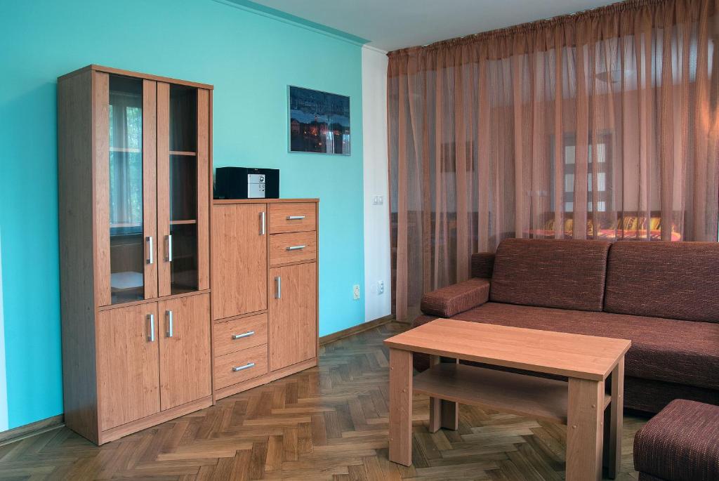 TV a/nebo společenská místnost v ubytování Penzion U Vinotéky