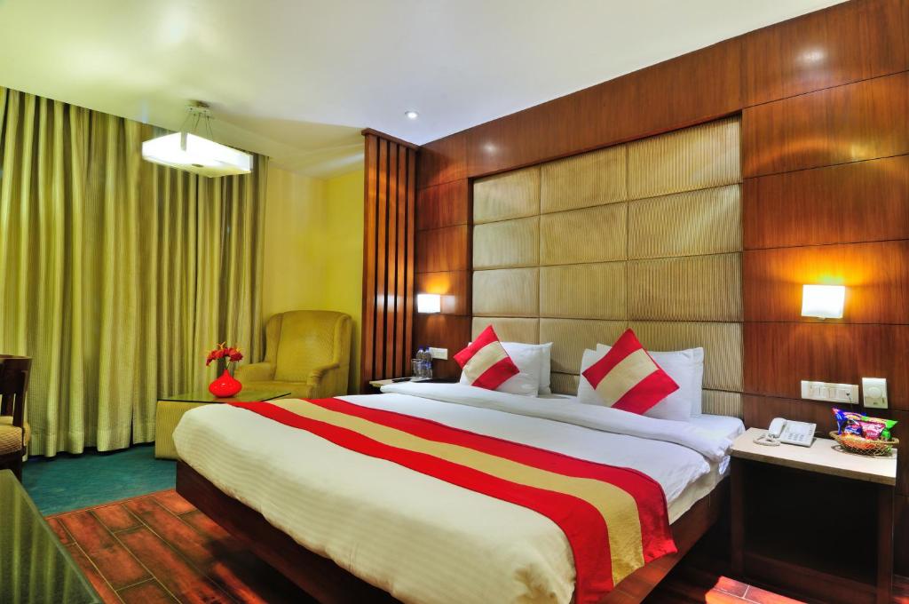 Postel nebo postele na pokoji v ubytování Hotel Aura - New Delhi Railway Station