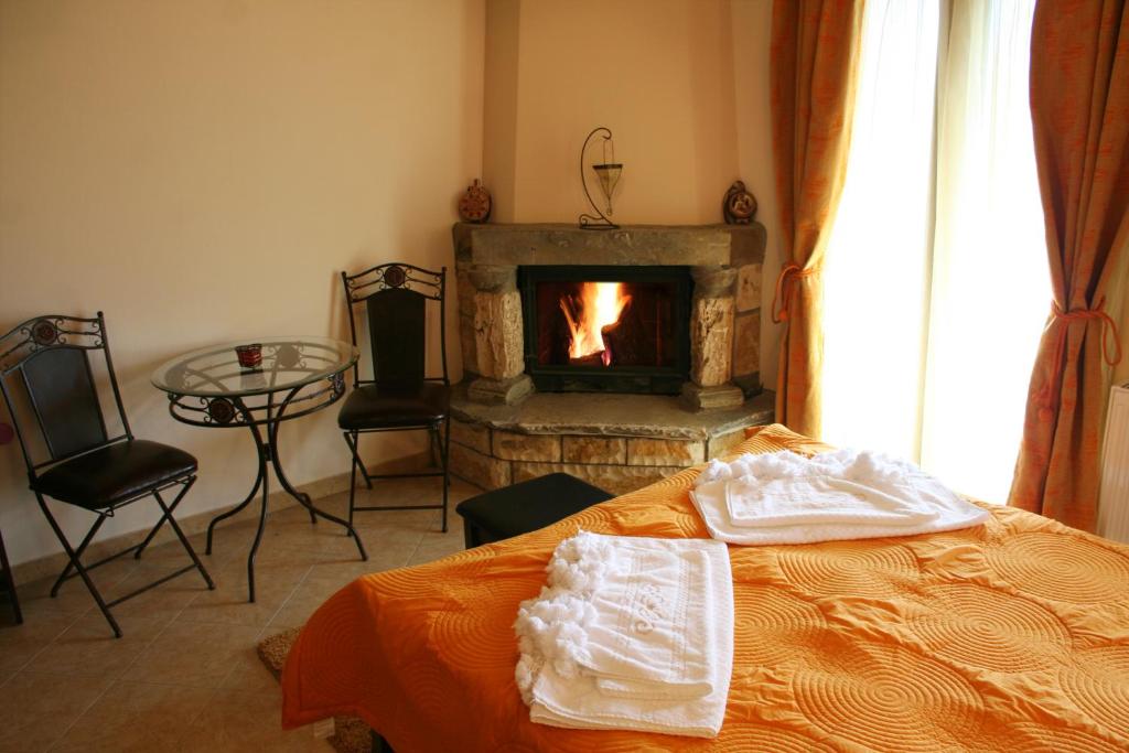 Posteľ alebo postele v izbe v ubytovaní Evilion Traditional Inn