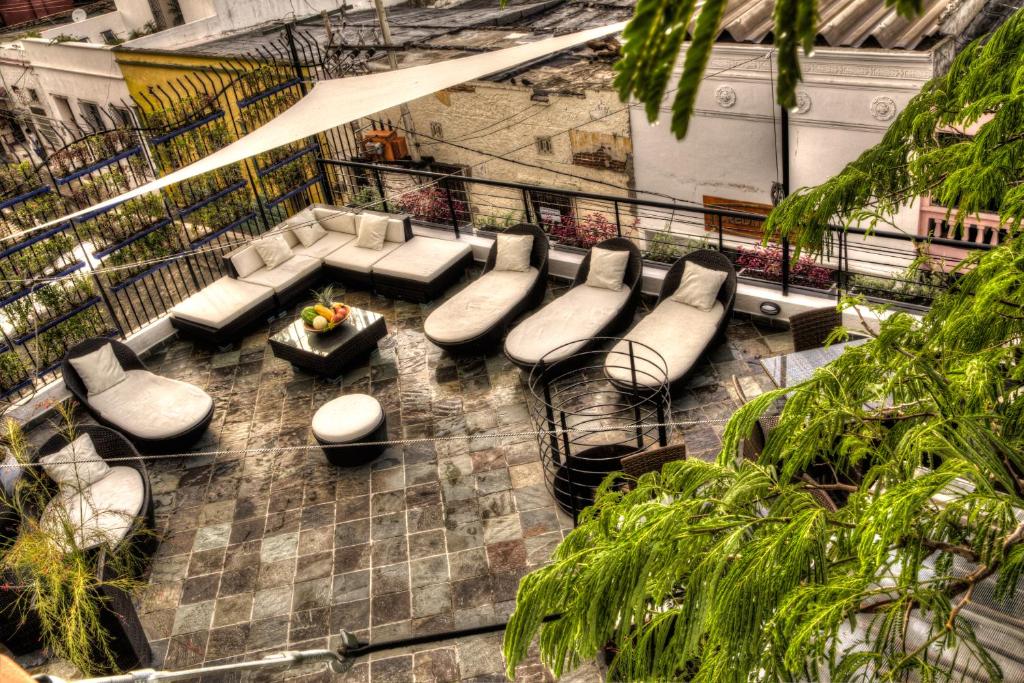 Posezení v ubytování Casa de Leda, a Kali Hotel