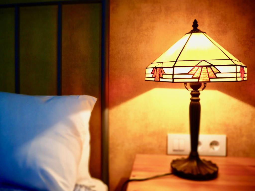 Postel nebo postele na pokoji v ubytování Privat Hotel Liberty Sitges