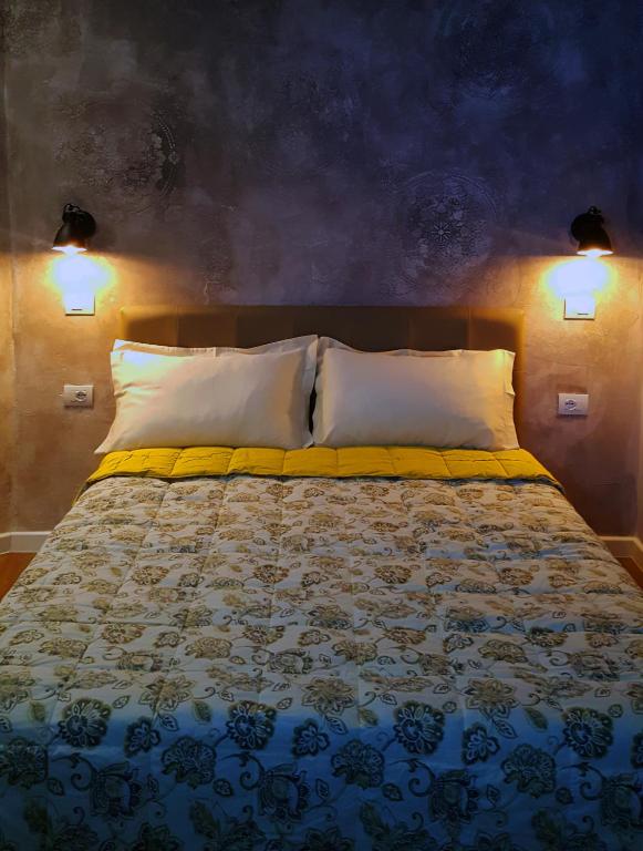 Кровать или кровати в номере Europa Apartment