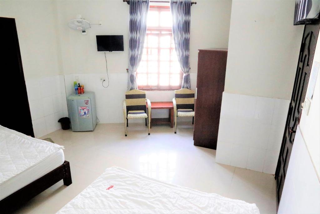 Minh Hung Hotel - Habitación Cuádruple