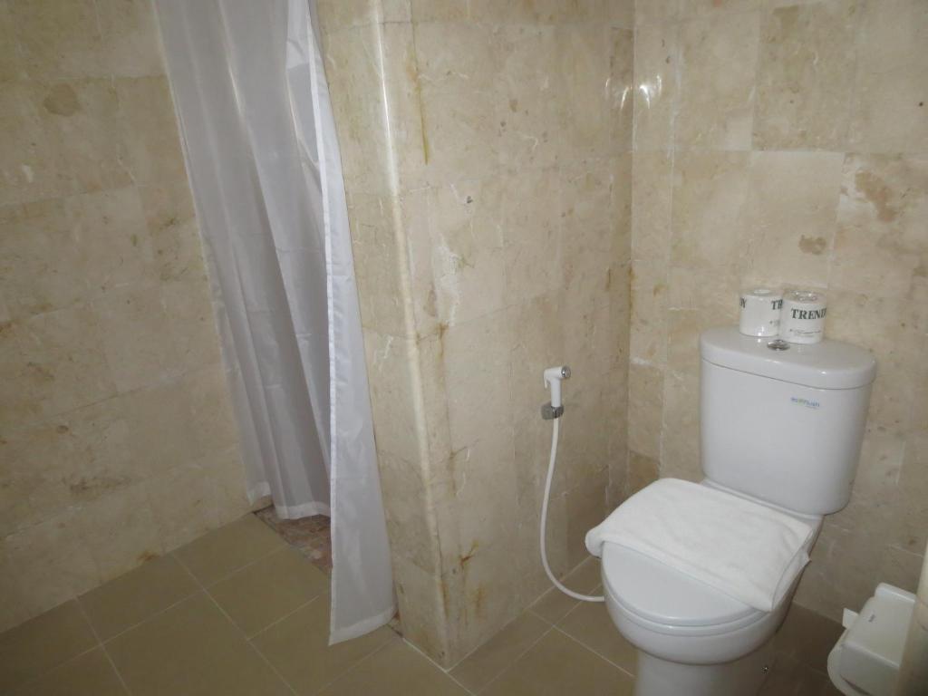 Koupelna v ubytování Swastika Bungalows