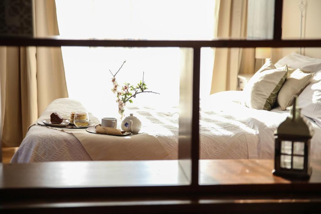 Postel nebo postele na pokoji v ubytování B&B Eyexei Domus