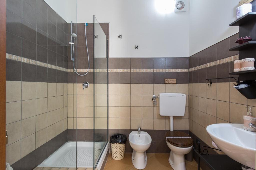 Koupelna v ubytování B&B Eyexei Domus
