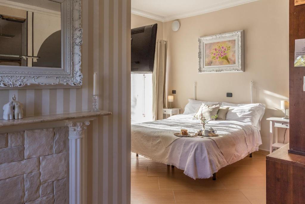 Postel nebo postele na pokoji v ubytování B&B Eyexei Domus