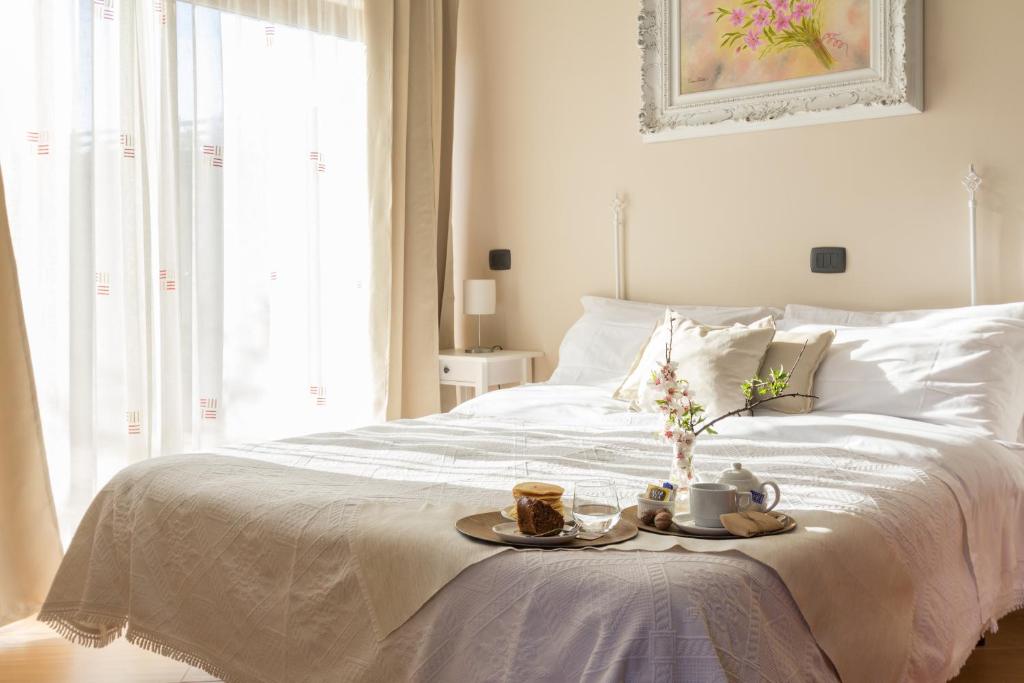 Postel nebo postele na pokoji v ubytování B&B Eyexei Domus
