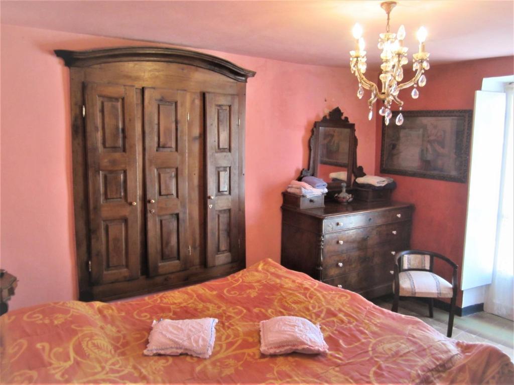Łóżko lub łóżka w pokoju w obiekcie B&B I Colori dell'Arcobaleno