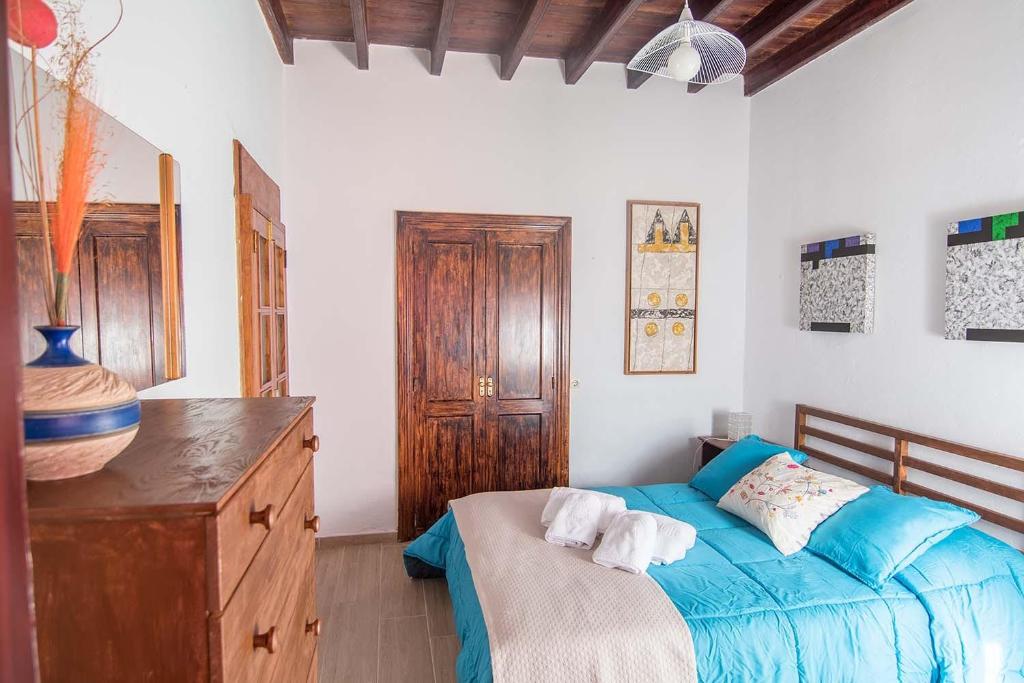 Posteľ alebo postele v izbe v ubytovaní Casa Terpsicore