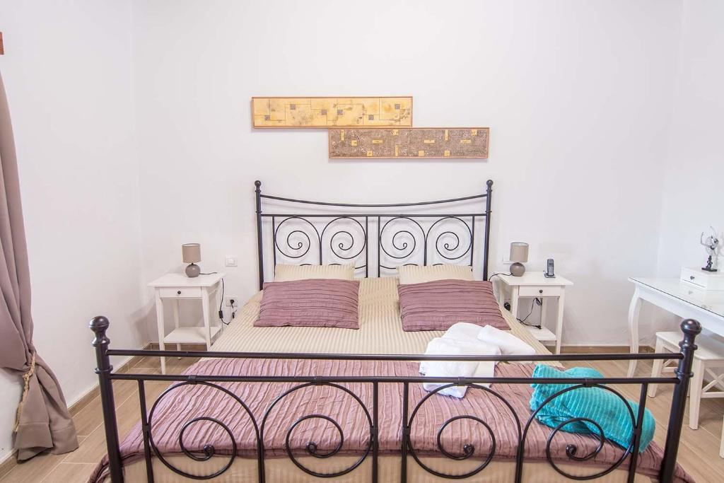 Posteľ alebo postele v izbe v ubytovaní Casa Terpsicore