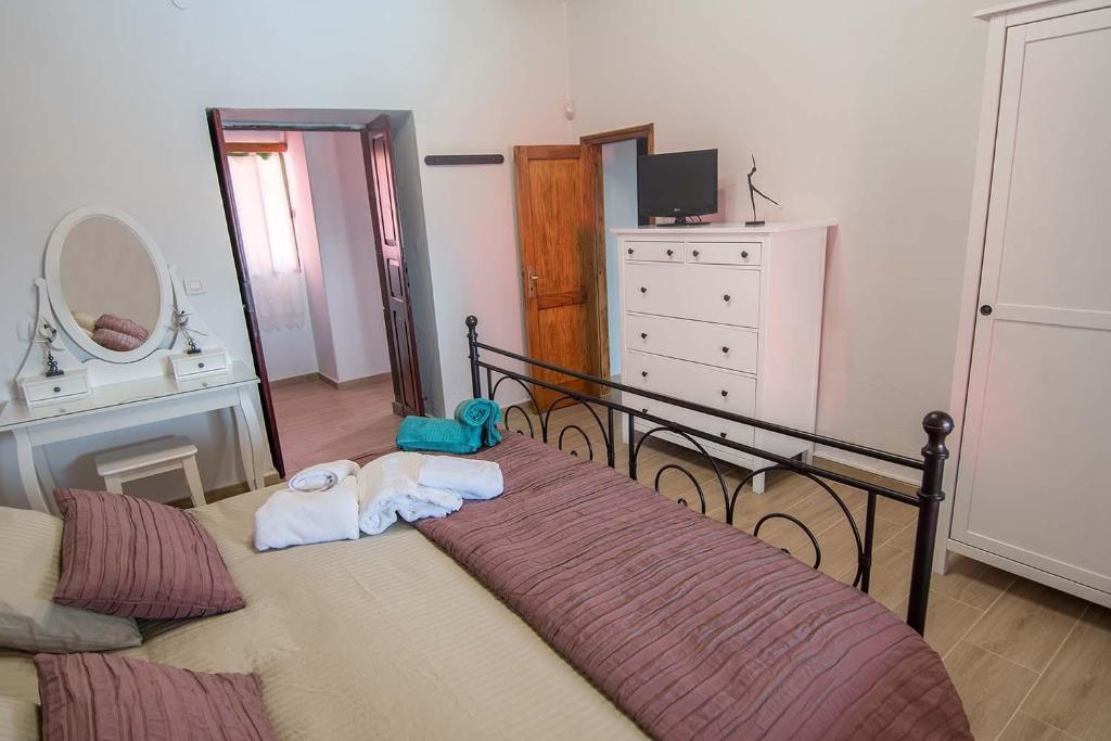 Posteľ alebo postele v izbe v ubytovaní Casa Terpsicore