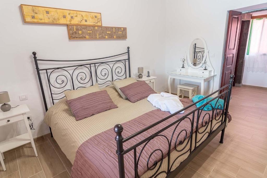 Posteľ alebo postele v izbe v ubytovaní Casa Terpsicore