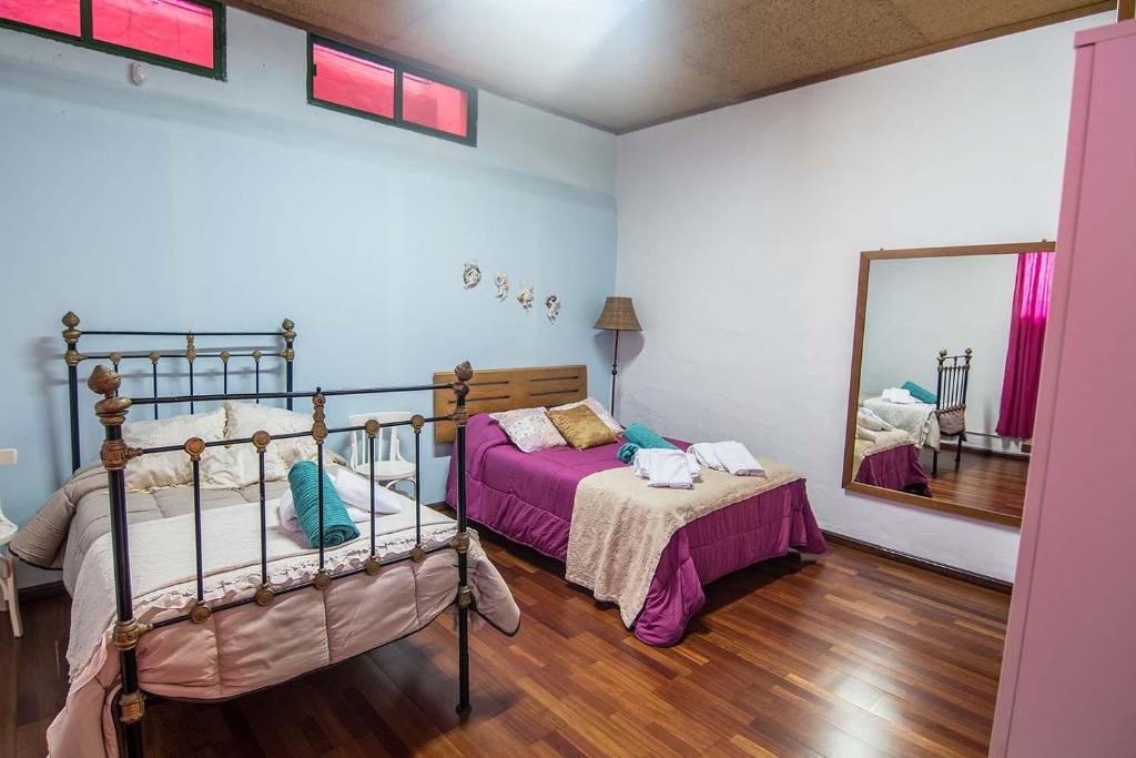 Posteľ alebo postele v izbe v ubytovaní Casa Terpsicore