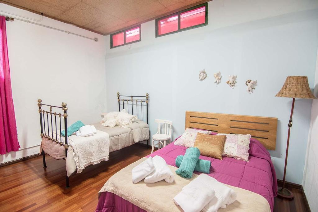 Posteľ alebo postele v izbe v ubytovaní Casa Terpsicore