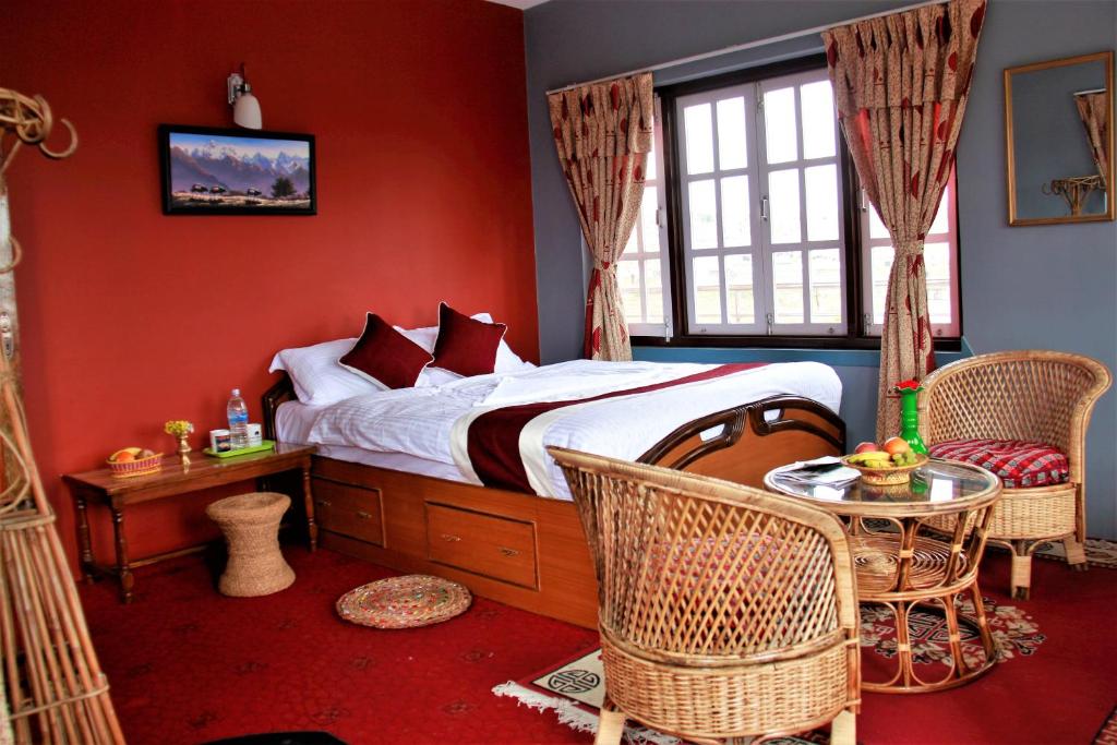 Postel nebo postele na pokoji v ubytování Homestay Nepal