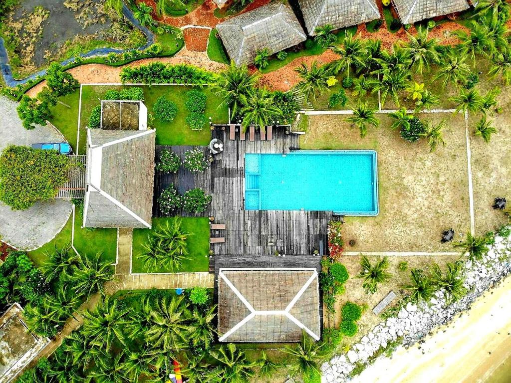 an overhead view of a swimming pool in a resort at Lawana Escape in Pran Buri