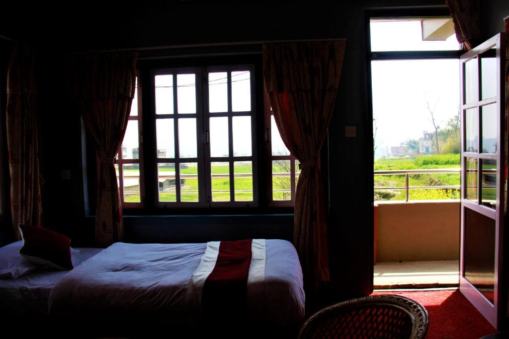 Postel nebo postele na pokoji v ubytování Homestay Nepal
