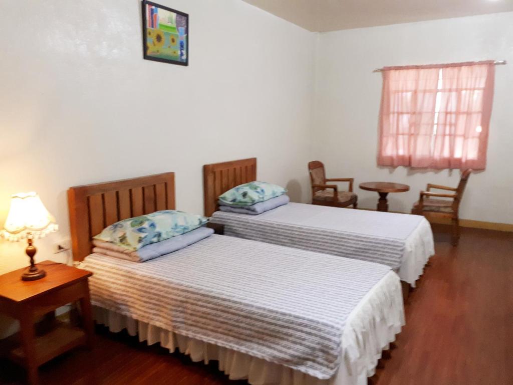 Postel nebo postele na pokoji v ubytování Minine Guesthouse