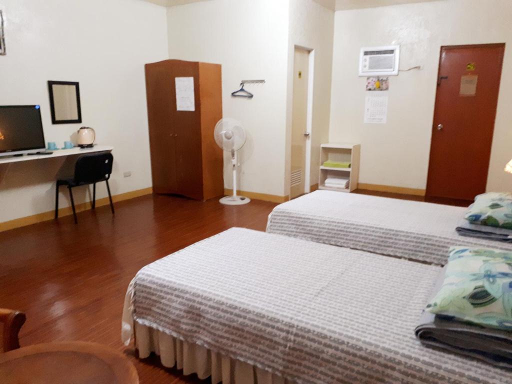 Postel nebo postele na pokoji v ubytování Minine Guesthouse