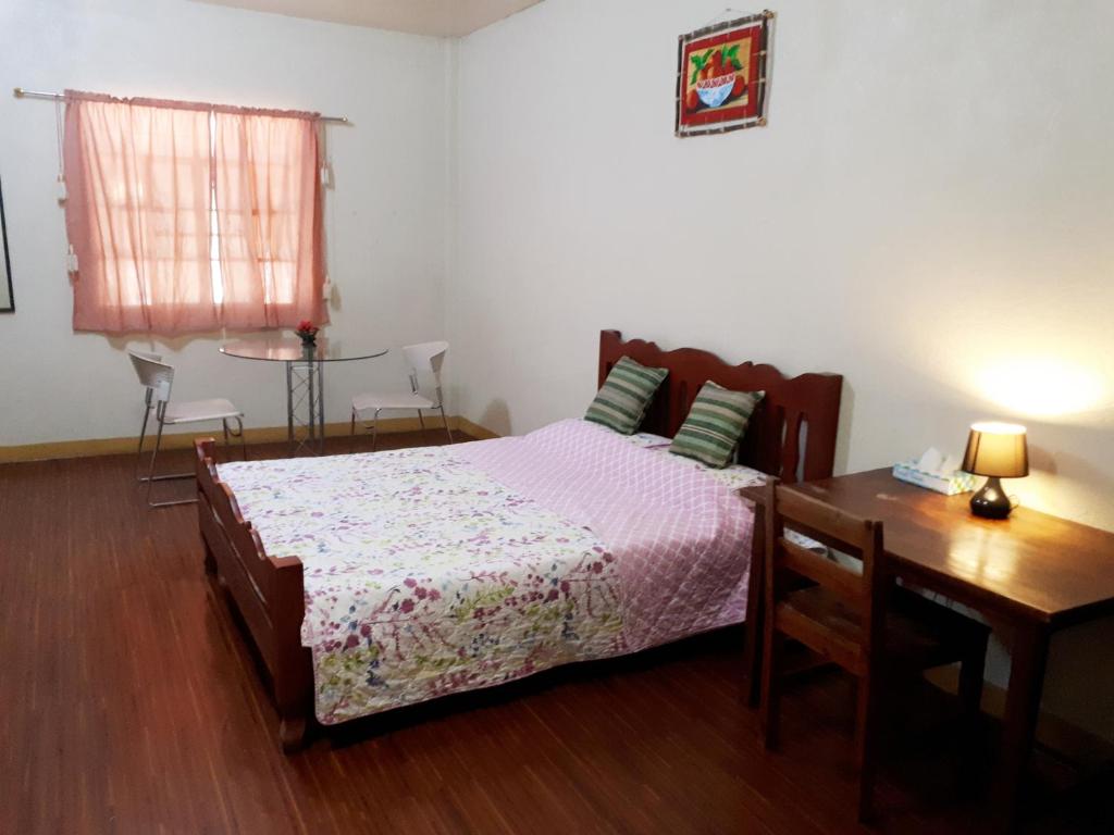 Postel nebo postele na pokoji v ubytování Minine Guesthouse