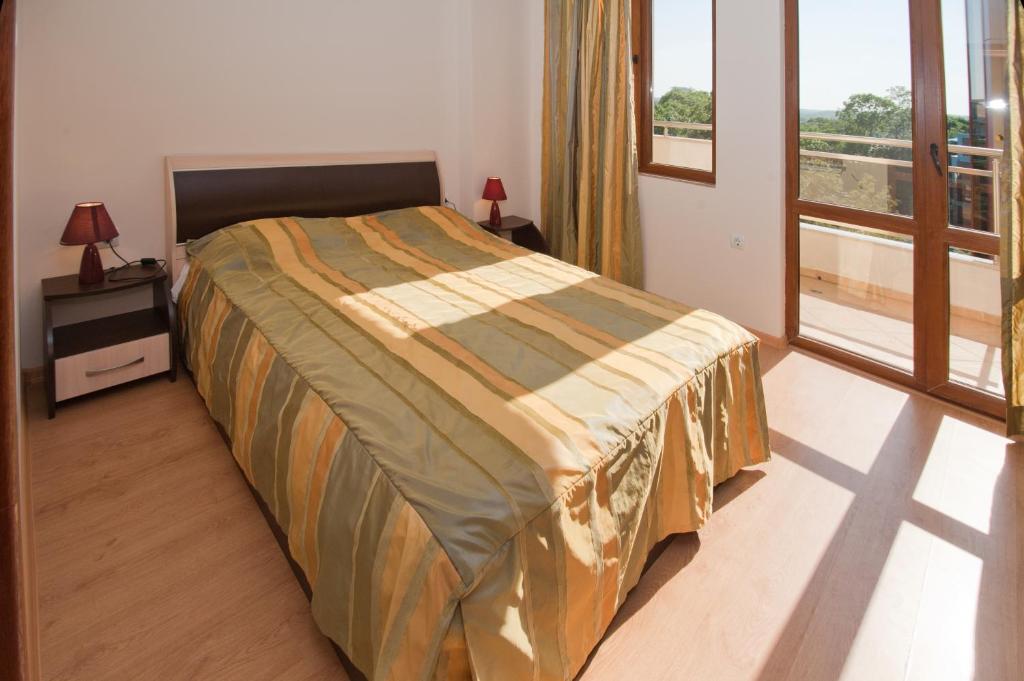 Postel nebo postele na pokoji v ubytování Hotel Sigma