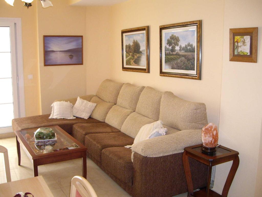 A seating area at exclusivo Atico en primera línea de playa