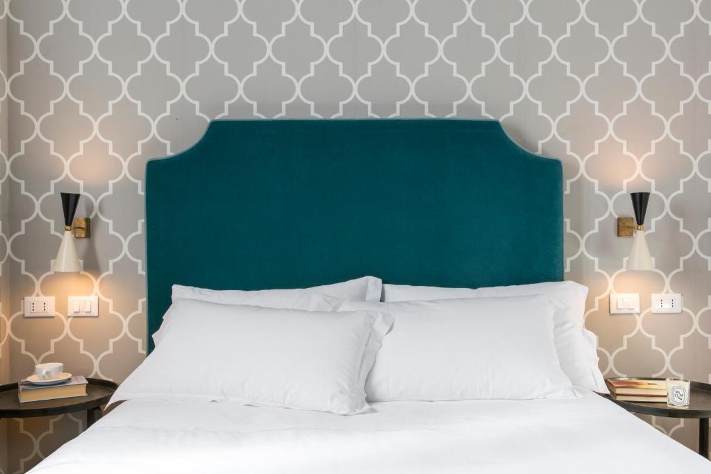 Postel nebo postele na pokoji v ubytování Favilla Hotel di Charme