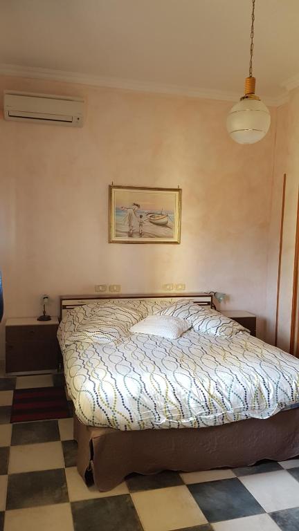 Łóżko lub łóżka w pokoju w obiekcie Guest house Il Nido