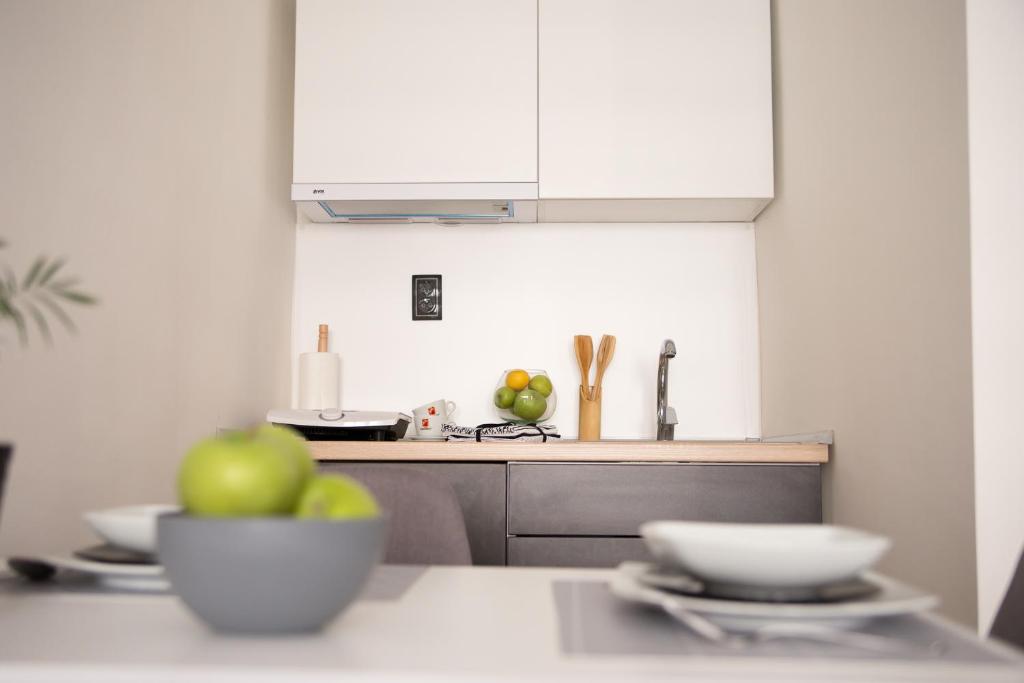 Kuchyň nebo kuchyňský kout v ubytování Sunrise Apartments