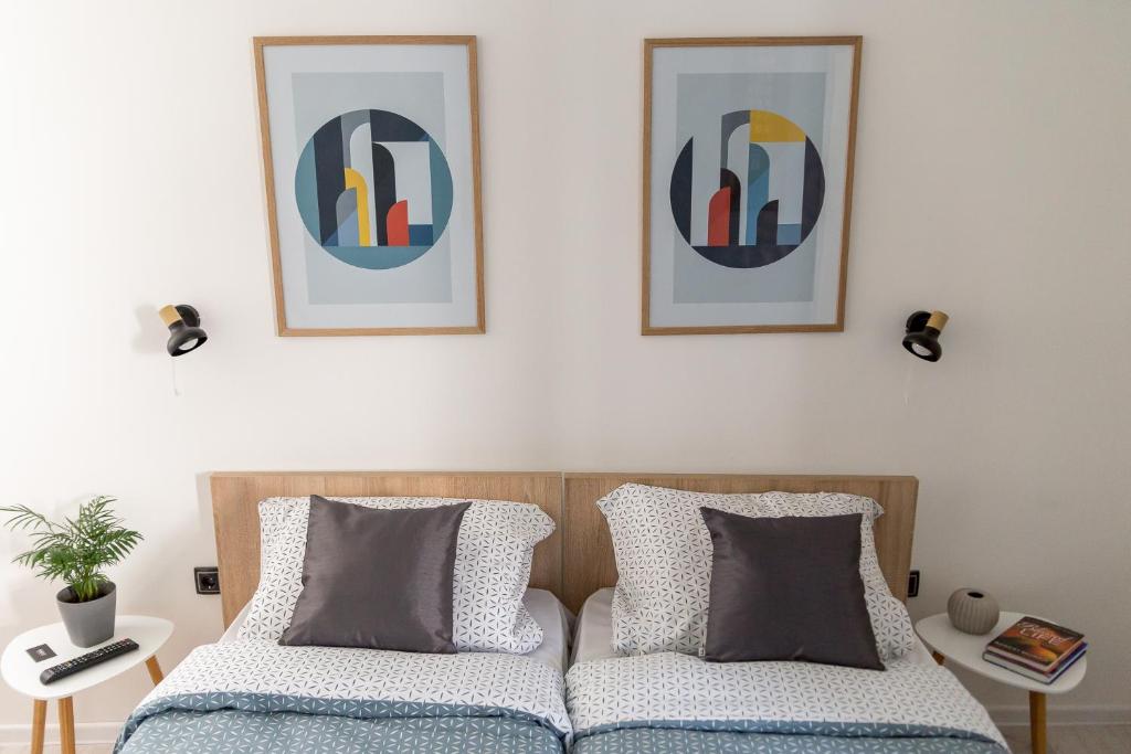 Postel nebo postele na pokoji v ubytování Sunrise Apartments